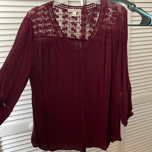 Maroon business casual dress top with lace. Thin flowing material.